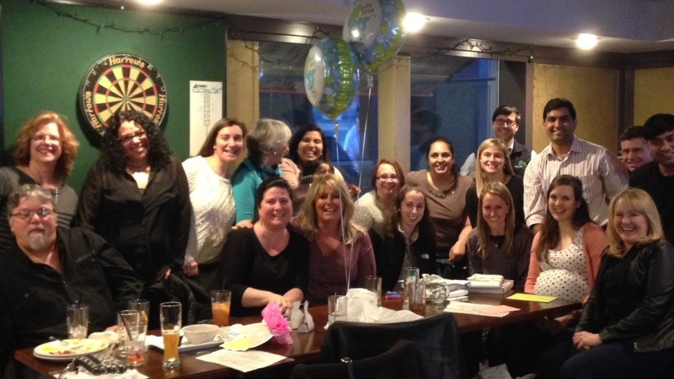 Photo of former fellows and staff at happy gathering