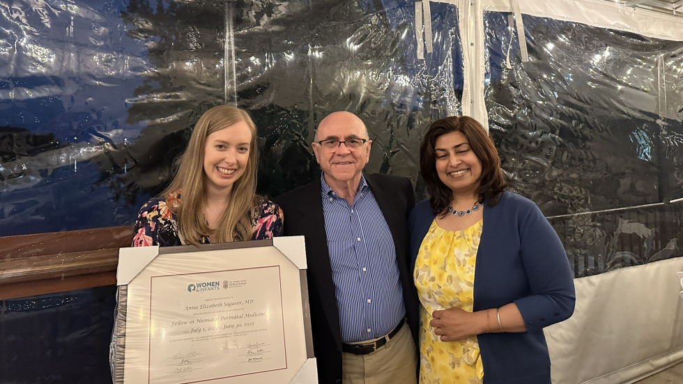 photo of Dr. Sagaser holding her diploma, along with Drs. Esteban and Nath