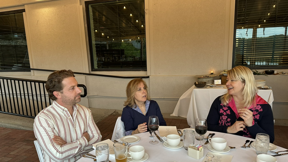photo of Drs. Zierk, Kasaroglu, and Maron at dinner table 