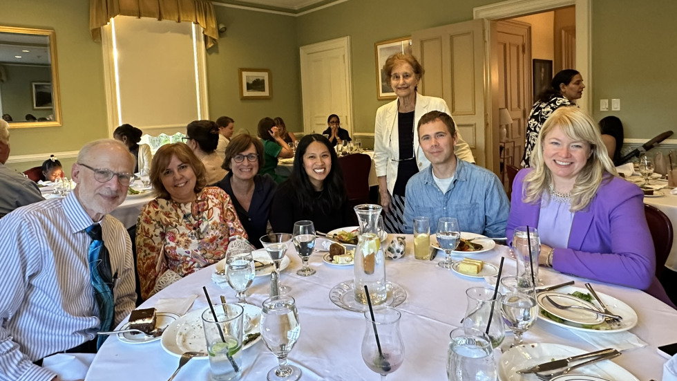 photo of faculty members at dinner table 